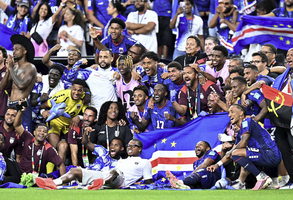 Cape Verde players celebrate after the match as they qualify for the knockout stages of the World Cup; June 26, 2026 (via Reuters/Maria Lysaker)